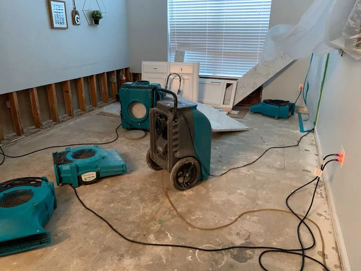 Dehumidifier in flood-cut room for Water Damage Restoration in Marshall